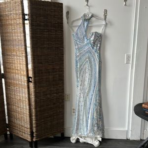 Custom fully hand beaded gown with unique neck and detail. Absolutely SHINES